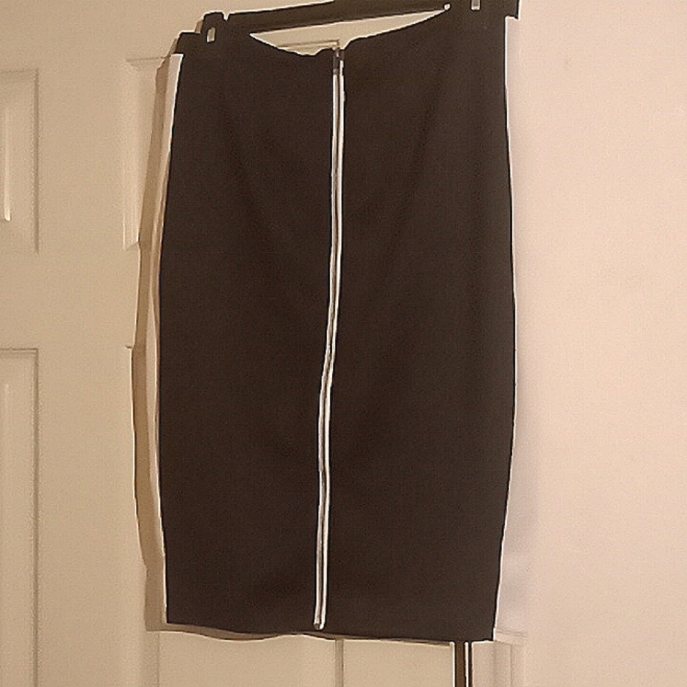Black skirt with white stripes on the sides